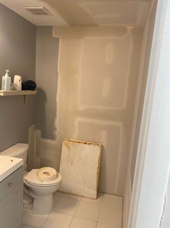 Bathroom renovation with new fixtures and finishes