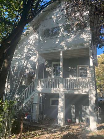 Multi-story exterior painting and repair project